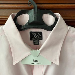 Jos. A. Bank pink button-down dress shirt.